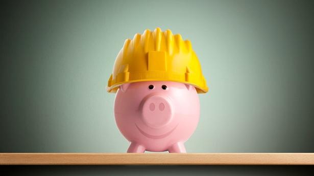 Piggy bank with hardhat